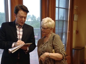 Democratic nominee Clay Aiken signs an autograph for a constituent after a campaign forum in Cary, North Carolina, April 28, 2014. The American Idol runner-up is bidding for a North Carolina congressional seat in his homestate's 2nd congressional district May 6, 2014.
REUTERS/Colleen Jenkins