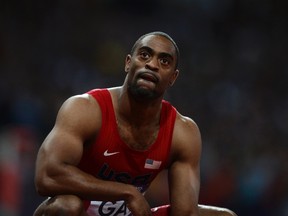 Tyson Gay of the U.S. reacts after finishing fourth in the men's 100m final during the London 2012 Olympic Games at the Olympic Stadium in this August 5, 2012 file photo. (REUTERS/Dylan Martinez/Files)
