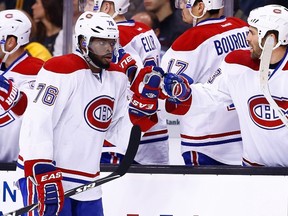 P.K. Subban #76 of the Montreal Canadiens is congratulated by teammates on the bench after scoring in the first period against the Boston Bruins in Game 1 of the Second Round of the 2014 NHL Stanley Cup Playoffs on May 1, 2014 in Boston, Massachusetts.   (Jared Wickerham/Getty Images/AFP)