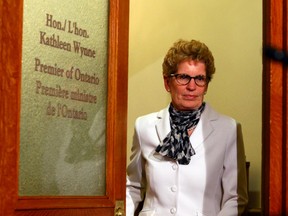 Ontario Premier Kathleen Wynne leaves her office on May 2, 2014 to announce she has called a provincial election for June 12. (Dave Abel/Toronto Sun)