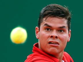 Milos Raonic was knocked out of the Portugal Open by Carlos Berlocq. (Reuters)