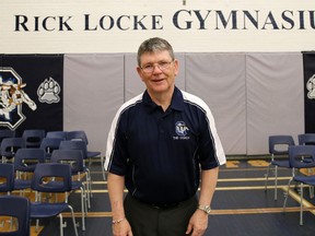 Rick Locke stands in the the Rick Locke Gymnasium after the official unveiling ceremony at Quinte Secondary School in Belleville Friday. 
Emily Mountney/The Intelligencer/QMI Agency