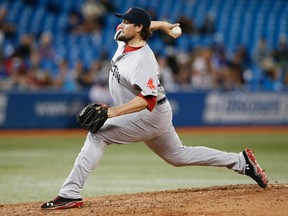 Boston Red Sox Joel Hanrahan throws to the Toronto Blue Jays during the ninth inning of their MLB American League baseball game in Toronto April 30, 2013. (REUTERS/Mark Blinch)