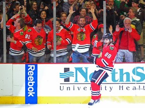 Chicago Blackhawks winger Patrick Kane celebrates a goal against the Minnestoa Wild during Game 1 of their Western Conference quarterfinal series at the United Center in Chicago, May 2, 2014. (DENNIS WIERZBICKI/USA Today)