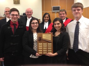 St. Patrick's students were the top team in the annual high-school mock trial competition held at the Sarnia courthouse. From left to right, in the back row, are the team's coach Blake Morrison, competition judges Justice Mark Hornblower, assistant Crown attorney Nila Mulpuru and defence lawyer James Guggisberg. In the front row from left are winning students  Chris Anthony, Anna Muscedere, MacKenzie Vozza and Curtis Wyrzykowski. NEIL BOWEN/THE OBSERVER/QMI AGENCY