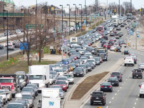The Gardiner Expressway, at left, is slow-moving on April 28 after one lane was closed in each direction for long-term construction. Lake Shore Blvd., foreground, is also jammed with overflow traffic.
Ernest Doroszuk/Toronto Sun