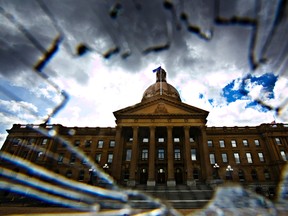The Alberta Legislature building is seen through a broken UV filter in Edmonton, Alta., on Monday, April 28, 2014. Codie McLachlan/Edmonton Sun file