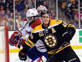 Montreal Canadiens defenceman P.K. Subban high sticks Boston Bruins centre David Krejci during Game 2 of their Eastern Conference semifinal series at TD Garden in Boston, May 3, 2014. (BOB DeCHIARA/USA Today)