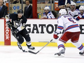 Pittsburgh Penguins star Sidney Crosby carries the puck up-ice against New York Rangers on Friday. Crosby has just two goals in the Penguins’ past 17 games. (Charles LeClaire/USA TODAY Sports)