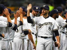 Milwaukee Brewers outfielder Ryan Braun was placed on the disabled list Saturday with a right oblique strain. (USA Today)
