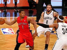 Raptors point guard Kyle Lowry looks to pass against the Brooklyn Nets in Game 6. (USA Today Sports)