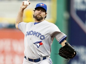 Toronto Blue Jays starting pitcher R.A. Dickey throws against the Pittsburgh Pirates at PNC Park in Pittsburgh, May 3, 2014. (CHARLES LeCLAIRE/USA Today)