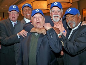 Baseball greats (left to right) Jim Bunning, Ferguson Jenkins, Gaylord Perry and Luis Tiant have some fun with Maple Leafs baseball team owner Jack Dominico (centre) at the Toronto Maple Leafs Forum and Reception at the Westin Bristol Place on Saturday.