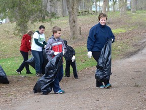 Vounteers clean up Memorial Park during the 10th annual Keep Tillsonburg Beautiful Day on Saturday. CHRIS ABBOTT/TILLSONBURG NEWS