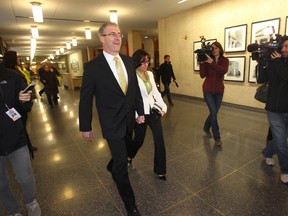 Gord Steves walks up to City Hall in Winnipeg with his wife Lorrie.  Steves officially entered the mayoral race today.  Friday, May 2, 2014.   Chris Procaylo/Winnipeg Sun/QMI Agency