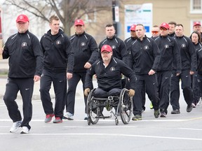 The Solider On Afghanistan Relay arrives in Belleville, ON., Sunday, May 4, 2014, during the first leg of the relay which is headed to Ottawa. The team consists of 16 military members, two Royal Canadian Mounted Police and one civilian, government employee, who all acquired a visible or non-visible illness or injury while in Afghanistan under Canadian Command. 
Emily Mountney/The Intelligencer/QMI Agency