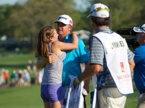 J.B. Holmes celebrates with his wife after winning the Wells Fargo Championship at Quail Hollow Club. (Joshua S. Kelly-USA TODAY Sports)