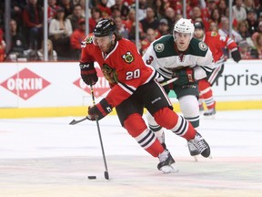 Chicago Blackhawks winger Brandon Saad carries the puck up-ice against the Minnesota Wild on Sunday. (Jerry Lai/USA TODAY Sports)