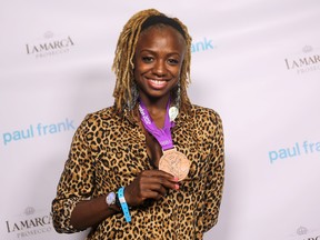 Dominique Blake, 2012 Olympic Bronze Medalist attends Paul Frank Fashion's Night Out on September 6, 2012 in West Hollywood, California. (Rachel Murray/Getty Images For Paul Frank/AFP)