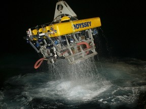 Odyssey's remotely operated vehicle (ROV) Zeus returns to the surface following work on a deep-ocean shipwreck site in this undated handout provided by Odyssey Marine Explorations, Inc April 29, 2014.
REUTERS/Odyssey Marine Explorations/Handout via Reuters