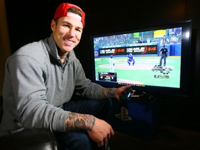Toronto Blue Jay Brett Lawrie at the official launch of "MLB 14: The Show" for PlayStation 4 at Real Sports in Toronto, on Wednesday April 23, 2014. (Dave Abel/QMI Agency)