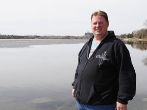 JOHN LAPPA/THE SUDBURY STAR 
Scott Hodgins, of Sudbury Boat and Canoe, surveys Ramsey Lake for ice on Monday. Hodgins is the judge for The Sudbury Star Ice Guessing Contest.