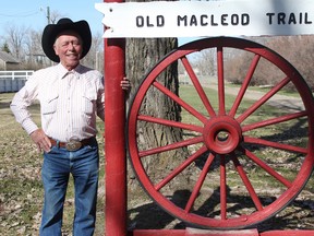 KEVIN RUSHWORTH HIGH RIVER TIMES/QMI AGENCY. Bill Dunn, Cayley resident and local historian, has been preserving the markers along the historic Macleod Trail for well over 10 years. Pictured above, Dunn stands by the High River marker in McLaughlin Meadows.