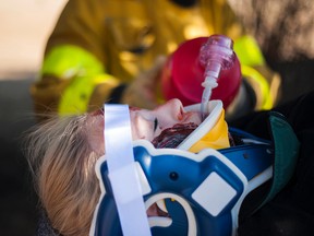 A mock accident victim is mock resuscitated during ‘It Can’t Happen to Me’ an initiative of Mannville’s Family and Community Support Services that shows students the full consequences, from immediately on scene to long-term, of impaired or distracted driving.