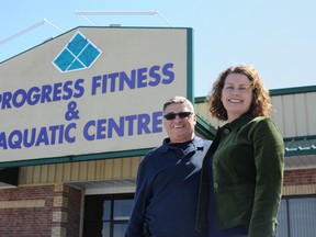 Dara Shaw Brachman, chair of the board of directors for YMCA, poses for a photo with Ross Venditti, Owner of Progress Fitness and Aquatic centre for over 20 years on Monday, outside Progress Fitness and Aquatic centre in Kingston.  
Justin Greaves/ For the Kingston Whig-Standard