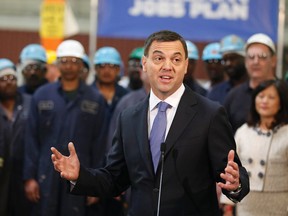 Ontario PC leader Tim Hudak makes a campaign stop at Automatic Coating Ltd. in Scarborough on Tuesday. (MICHAEL PEAKE/Toronto Sun)