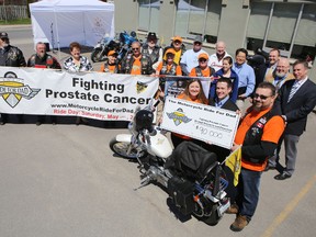 Organizers of this year's Ride for Dad present a donation of $90,000 to the University Hospitals Kingston Foundation. The money is to support four research projects in Kingston.
ELLIOT FERGUSON/KINGSTON WHIG-STANDARD/QMI AGENCY