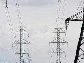 Power line towers are seen looking westbound at 50 St., just south of Anthony Henday Drive in Edmonton on April 21, 2011.  TOM BRAID/EDMONTON SUN