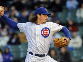 Chicago Cubs starting pitcher Jeff Samardzija (29) pitches against the Chicago White Sox at Wrigley Field on May 5, 2014. (MATT MARTON/USA TODAY Sports)