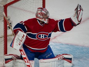Canadiens goalie Carey Price makes a glove save during first period action against the Bruins in Game 3 of their NHL playoff series in Montreal on Tuesday, May 6, 2014. (Martin Chevalier/QMI Agency)