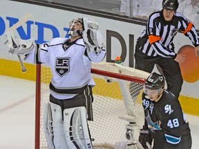 Jonathan Quick and the Los Angeles Kings have won six straight games since opening the playoffs with three losses. (REUTERS)