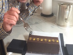 Our Frank tucks into a piece of award-winning chocolate cake from the Ritz-Carlton.
