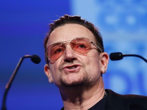 Singer Bono of U2 speaks at the European People's Party (EPP) Elections Congress in Dublin March 7, 2014. (REUTERS/Suzanne Plunkett)