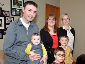 The O’Reilly family, Jim with baby Shaylyn, Charlene; Sandy McGlynn, one of the many organizers, Dean and big brother Ben.