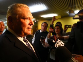 Councillor Doug Ford speaks to reporters at City Hall on Wednesday. (DAVE ABEL/Toronto Sun)