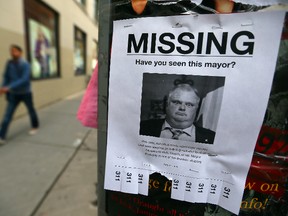 Someone posted a missing person flyer at Adelaide and Peter Sts. on May 7, 2014. (Dave Abel/Toronto Sun)