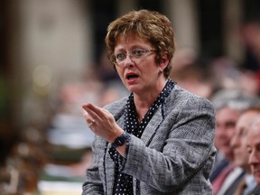 Canada's Public Works Minister Diane Finley speaks during Question Period in the House of Commons on Parliament Hill in Ottawa February 5, 2014. (REUTERS/Chris Wattie)