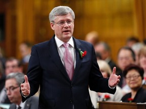 Canada's Prime Minister Stephen Harper speaks during Question Period in the House of Commons on Parliament Hill in Ottawa May 7, 2014. (REUTERS/Chris Wattie)