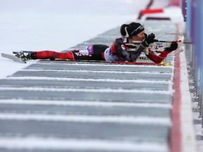 Canada's Megan Imrie shoots during the women's biathlon 15km individual event at the Sochi 2014 Winter Olympic Games in Rosa Khutor February 14, 2014.              REUTERS/Sergei Karpukhin (RUSSIA  - Tags: SPORT BIATHLON OLYMPICS)