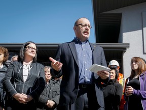 Ric McIver speaks in front of supporters outside his home in Calgary, Alta., on Wednesday, May 7, 2014. McIver announced his bid for the provincial PC leadership. Lyle Aspinall/Calgary Sun/QMI Agency