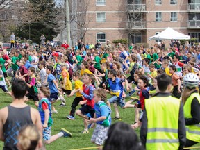 More than 340 Grade 3 and 4 students took part in the atom boys race during the LCVI Road Race at Loyalist Collegiate on Wednesday. (Julia McKay/The  Whig-Standard)