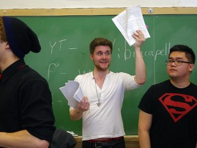 Daevyd Pepper, a co-leader of the York University student a cappella singing group, asks Central Elgin Collegiate Institute students what song they want to learn, Wednesday in St. Thomas.
