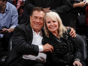 Donald Sterling, owner of the Los Angeles Clippers, and his wife Shelly pose for a photograph. (Andrew D. Bernstein/NBAE via Getty Images/AFP)