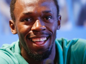 Jamaican sprinter Usain Bolt addresses a news conference ahead of the IAAF Diamond League athletics meeting, also known as Memorial Van Damme, in Brussels September 4, 2013. (REUTERS)
