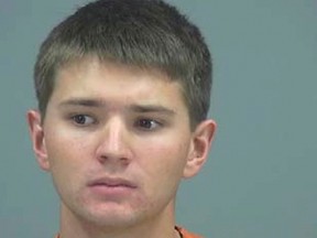 Tyler Kost, 18, is shown in this booking photo provided by Pinal County Sheriff's Office in Florence, Arizona May 8, 2014.  The Arizona high school student whom authorities accuse of being a serial rapist has been indicted on multiple counts of sex-related crimes for attacks on 11 girls, one as young as 12 years old, according to authorities.  
REUTERS/Pinal County Sheriff's Office