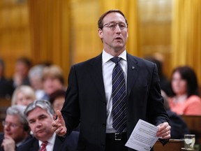 Canada's Justice Minister Peter MacKay speaks during Question Period in the House of Commons on Parliament Hill in Ottawa May 6, 2014. (REUTERS/Chris Wattie)